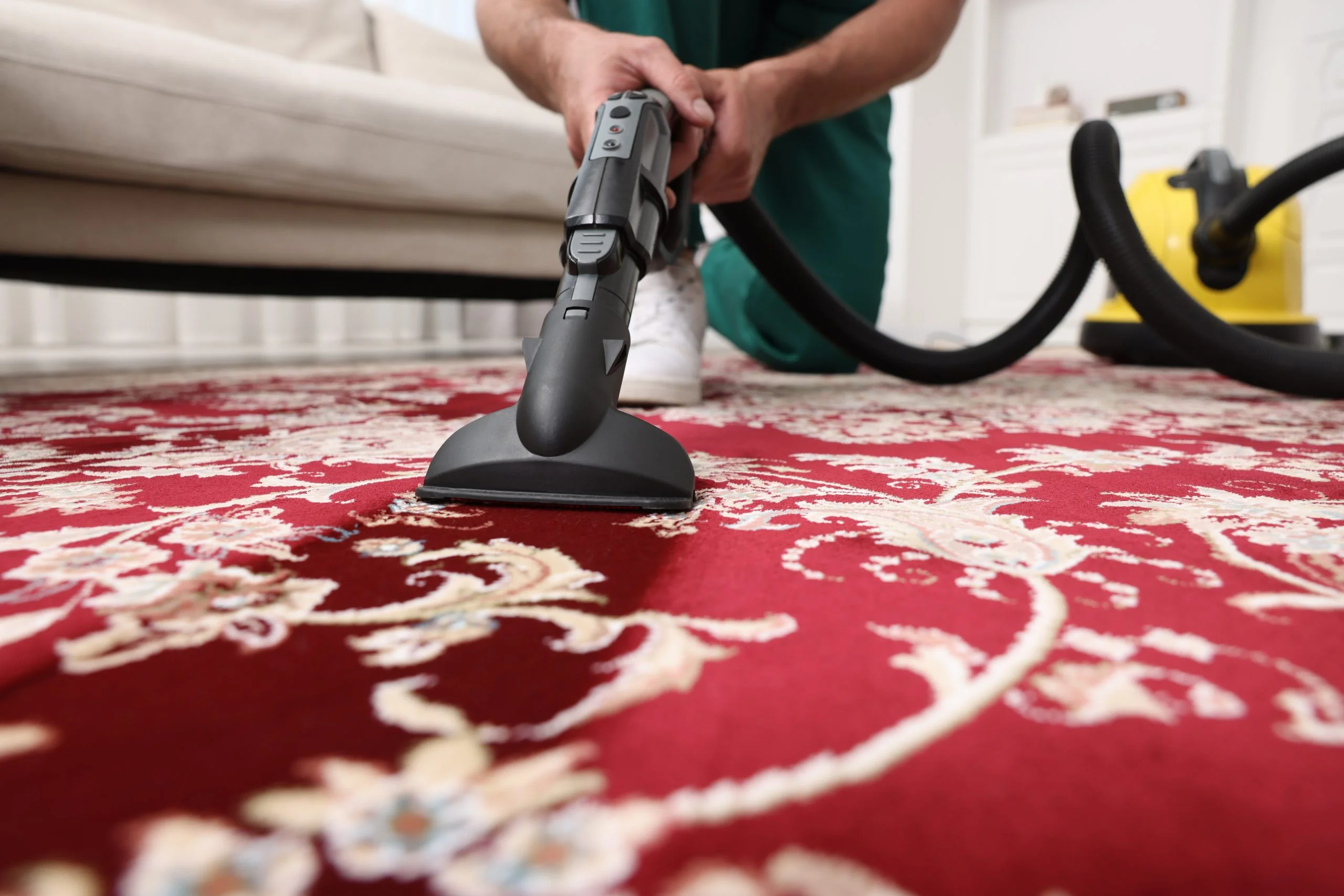 Dry,Cleaner’s,Employee,Hoovering,Carpet,With,Vacuum,Cleaner,Indoors,,Selective Rug Cleaning For Allergies
